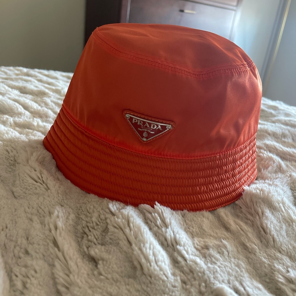 Barely worn Small Orange Prada bucket hat